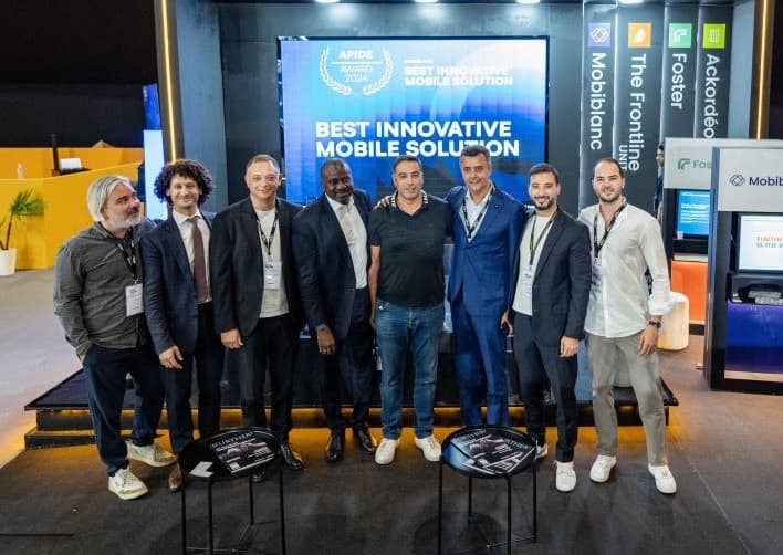 Hassan Lahlou, founder of Digital Nova, receiving an award at APIDE 2024